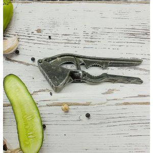 Часникодавка металева